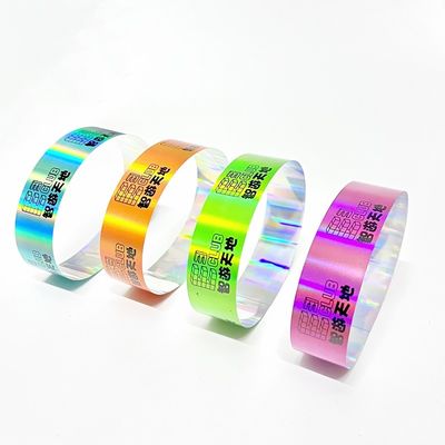 Fabbrica all'ingrosso Laser Glitter Wrist Strap Neon Color Ranibow Laser Barcode Logo Brillante Laser Paper Wristband Per Evento