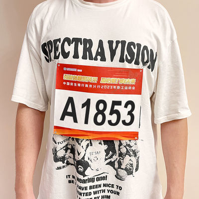 Stampa serigrafica di numeri pettorali personalizzati in Tyvek ad alta visibilità